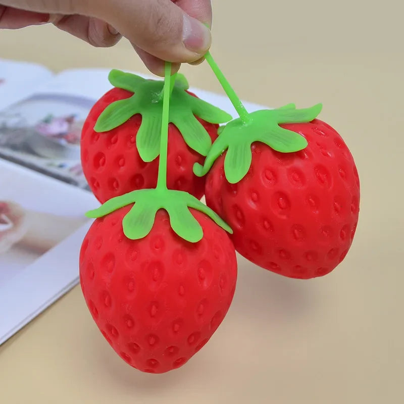 Balle Anti-Stress Fraise Sonore – Relaxation & Fun